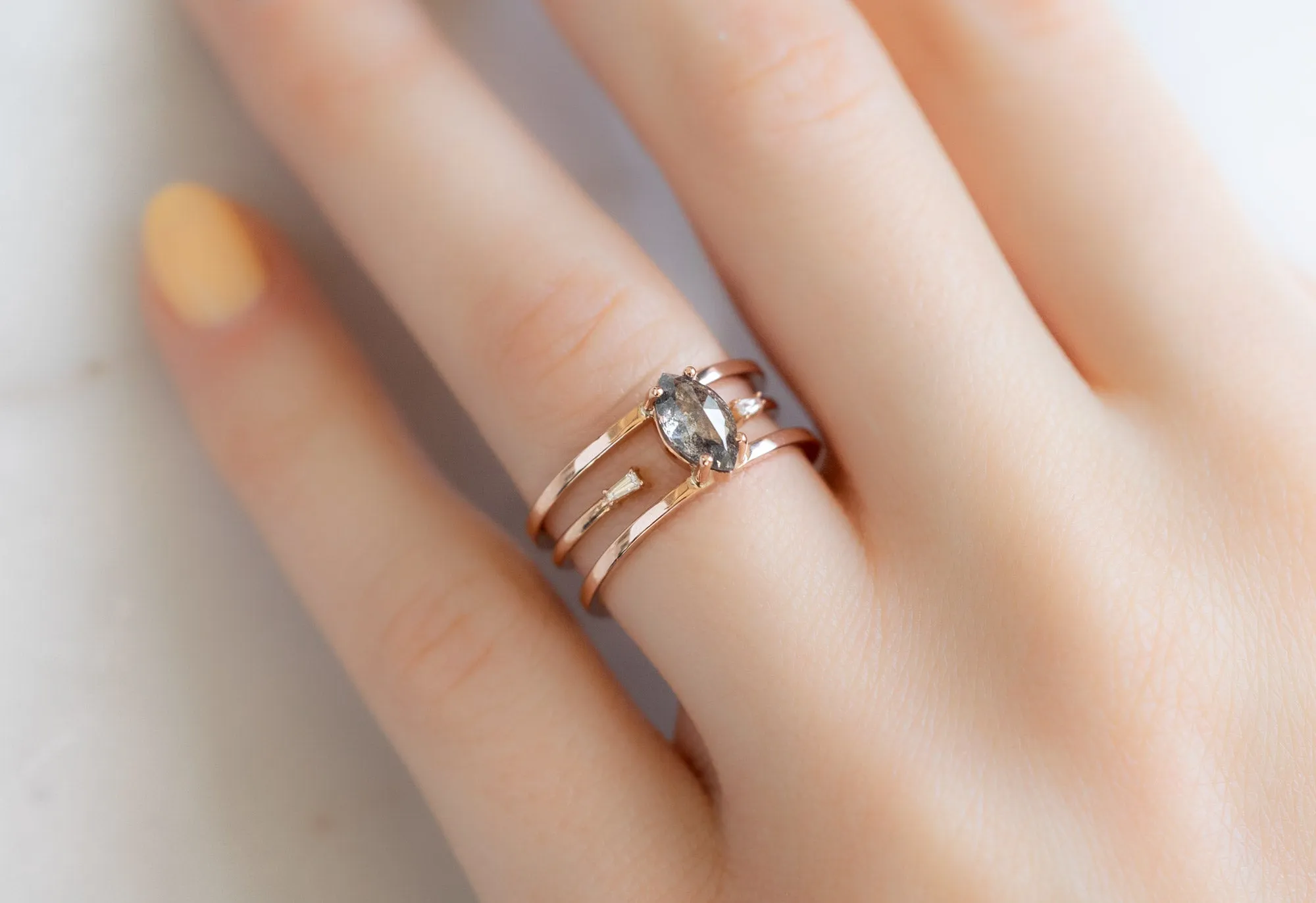 The Poppy Ring with a Salt and Pepper Marquis Diamond